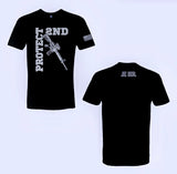 Black. 60% cotton, 40% polyester. Crew neck. front of shirt features the phrase “protect 2nd” with a gun on front of shirt. It is screen printed white. The word protect is aligned vertically along left side of shirt. The word 2nd is aligned horizontally at top of logo. A rifle is aligned at the center, under phrase protect 2nd. back of t-shirt features a small Joe Local logo under neck which is centered and aligned horizontally. left sleeve features a white screen printed American flag logo.