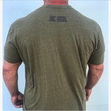 Back of T-shirt. Joe Local logo in navy blue is featured at the top center of the shirt under the neck. The following is description is for the front of the shirt. Military green t-shirt with navy blue Joe Local So Cal flag logo at the center of the chest. Well-fitted and comfortable t-shirt. Fabric: CVC Jersey 60% Combed Ring-Spun Cotton 40% Polyester /32 singles, 145 grams/4.3 oz Neck: Crew